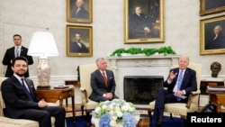 U.S. President Joe Biden meets with Jordan's King Abdullah II and Crown Prince Hussein bin Abdullah II in the Oval Office at the White House in Washington, July 19, 2021. 