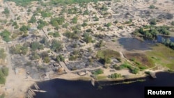 FILE - An aerial view shows Ngouboua after it was attacked by Boko Haram militants, Feb. 13, 2015. An attack by the group on Oct. 27, 2024, targeted a garrison in the area housing more than 200 Chadian soldiers.