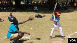 Kelly Lemaiyen, captain of the Kilimanjaro All-Stars, is one of the shortest members on the team, and one of the youngest at just 12, but he commands respect on the baseball diamond. (L. Ruvaga/VOA) 