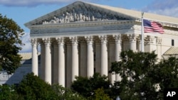 In this Oct. 18, 2021 photo, the Supreme Court is seen in Washington. Texas is urging the Supreme Court to leave in place its law banning most abortions and telling the justices there’s no reason to rush into the case. 