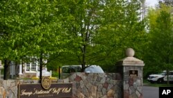 FILE - The entrance to Trump National Golf Club in Bedminster, N.J., is pictured May 7, 2017.