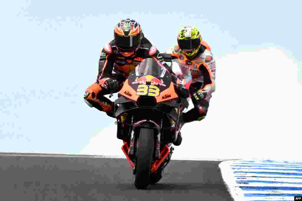 Red Bull KTM Factory Racing team rider Brad Binder of South Africa speeds through a corner during a MotoGP practice session at the Australian MotoGP on Philip Island.