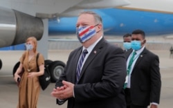 U.S. Secretary of State Mike Pompeo walks to board an aircraft to leave for Maldives, in Colombo, Sri Lanka, Oct. 28, 2020.