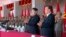 FILE - North Korean leader Kim Jong Un, center, along with Liu Yunshan, China's Communist Party's No. 5 leader, second right, claps hands during the ceremony to mark the 70th anniversary of the country's ruling party in Pyongyang, October 10, 2015.