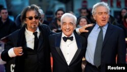 Director Martin Scorsese and cast members Al Pacino and Robert De Niro pose as they arrive for the screening of "The Irishman" during the 2019 BFI London Film Festival at the Odeon Luxe Leicester Square in London, Britain October 13, 2019.