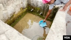 Fonte de água no bairro Cangambo Malanje