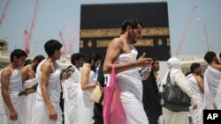 Muslim pilgrims circle the Kaaba, the cubic building at the Grand Mosque in the Muslim holy city of Mecca, Saudi Arabia, Sept. 22, 2015.