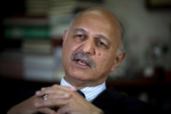 In this Nov. 30, 2018 photo, Mushahid Hussain, chairman of Pakistan's Senate Foreign Affairs Committee, speaks to The Associated Press in Islamabad, Pakistan.