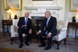 U.S. Vice-President Mike Pence meets with Britain's Prime Minister Boris Johnson on Downing Street in London, Sept. 5, 2019.