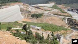 This Oct. 6, 2012 photo shows a construction site of a dam being built by China National Heavy Machinery Corporation on the Tatay River in Koh Kong province, some 210 kilometers (130 miles) west of Phnom Penh, Cambodia. 