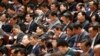 Chinese top leaders attends the third plenary session of the National People&#39;s Congress (NPC) at Great Hall of the People in Beijing, China, Monday, March 10, 2014. 