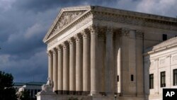 FILE - The U.S. Supreme Court building is seen in Washington, June 8, 2021. 