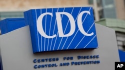 FILE - The Centers for Disease Control and Prevention is shown Sunday, March 15, 2020, in Atlanta.The CDC is working to confirm a diagnosis of Lassa fever in the death of an Iowa man who had traveled to West Africa. 