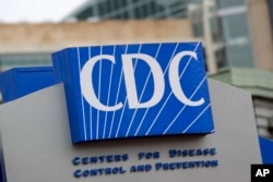 FILE - The Centers for Disease Control and Prevention is shown Sunday, March 15, 2020, in Atlanta.The CDC is working to confirm a diagnosis of Lassa fever in the death of an Iowa man who had traveled to West Africa. 