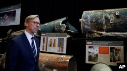 Brian Hook, U.S. special representative for Iran, walks past fragments of Iranian short range ballistic missiles (Qiam) at the Iranian Materiel Display (IMD) at Joint Base Anacostia-Bolling, in Washington, Nov. 29, 2018. 