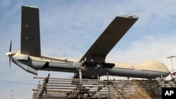 FILE - An Iranian Shahed-129 drone is displayed by armed forces at a rally in Tehran, Iran, Feb. 11, 2016. 