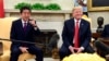 FILE - President Donald Trump meets with Japanese Prime Minister Shinzo Abe in the Oval Office of the White House in Washington, June 7, 2018. 