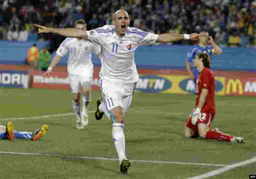 Slovakia's Robert Vittek celebrates after his second goal during the World Cup group F soccer match between Slovakia and Italy at Ellis Park Stadium in Johannesburg, South Africa, Thursday, June 24, 2010. (AP Photo/Gero Breloer)