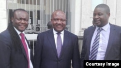 Lawyer David Hofisi, Mayor Bernard Manyenyeni and lawyer Dzimbabwe Chimbga outside the Harare High Court