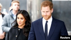 FILE - Britain's Prince Harry and Meghan, Duchess of Sussex in London, Britain.