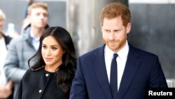 FILE - Britain's Prince Harry and Meghan, Duchess of Sussex in London, Britain.