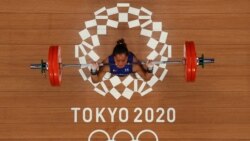 Philippines' Hidilyn Diaz competes in the women's 55kg weightlifting competition during the Tokyo 2020 Olympic Games at the Tokyo International Forum in Tokyo on July 26, 2021.