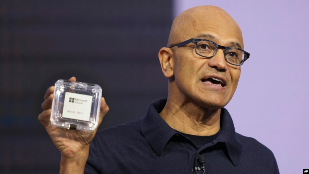 Microsoft CEO Satya Nadella introduces the Azure Boost DPU at the company's Ignite conference Tuesday, Nov. 19, 2024, in Chicago. (AP Photo/Charles Rex Arbogast)