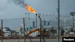 FILE - A view of the Mellitah Oil and Gas complex, 100 kilometrs west of Tripoli, Nov. 7, 2013.