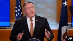 Secretary of State Mike Pompeo holds a news conference at the State Department on March 25, 2020, in Washington. Pompeo said the Group of Seven members were all aware of China's "disinformation campaign" regarding the coronavirus outbreak.