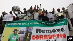 People protest following the removal of fuel subsidy by the Government in Lagos, Nigeria, January 2012. 