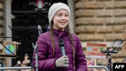 Swedish climate activist Greta Thunberg speaks on stage during a demonstration of students calling for climate protection on March 1, 2019, in front of the city hall in Hambourg, Germany. 