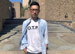 Nathan Law, a Hong Kong democracy activist and current graduate student at Yale, poses on the school campus in New Haven, Conn., Sept. 23, 2019.