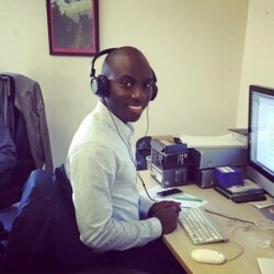 Paris-based Malian journalist Moise Mounkoro works on stories for his new online website. (Courtesy of Moise Mounkoro)