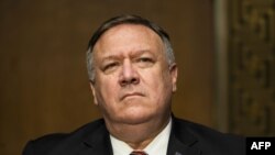 WASHINGTON, DC - JULY 30: US Secretary of State Mike Pompeo prepares to testify before a Senate Foreign Relations committee hearing on the State Departments 2021 budget in the Dirksen Senate Office Building on July 30, 2020 in Washington, DC. Jim…