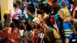 Cirque du Soleil performers from The Beatles LOVE show perform in the casino at the The Mirage hotel-casino before the reopening of the show Aug. 26, 2021, in Las Vegas. 