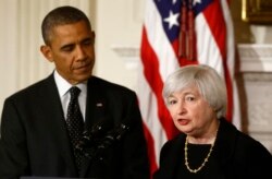 El presidente Barack Obama aparece en la fotografía, el miércoles 9 de octubre de 2013, junto a Janet Yellen.