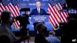 FILE - Democratic presidential candidate former Vice President Joe Biden speaks at a campaign event at the William "Hicks" Anderson Community Center in Wilmington, Del., July 28, 2020.