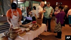 FILE - Retired Americans gather in a market in Boquete, west of Panama City, Panama. The country has become a hot spot for American retirees. 