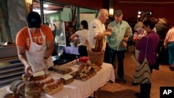 FILE - Retired Americans gather in a market in Boquete, west of Panama City, Panama. The country has become a hot spot for American retirees. 