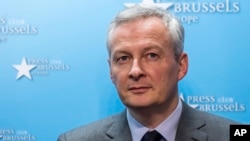 FILE - France's Finance and Economy Minister Bruno Le Maire speaks during a media conference regarding steel tariffs in Brussels on March 12, 2018.