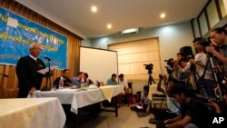 Aung Thein, a founding member of Burma Lawyers Network, talks during a press conference on the investigation about the Nov. 29 crackdown at Letpadaung copper mine in central Burma, Yangon, February 14, 2013.