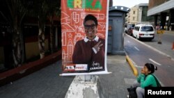 Election campaign posters of Erika Farias, government candidate for mayor of Libertador district, hang in Caracas, Venezuela, Dec. 8, 2017.