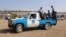 Members of a Yemeni coast guard force ride on the back of a petrol truck during their deployment as part of a U.N.-sponsored peace agreement signed in Sweden earlier this month, at the Red Sea city of Hodeidah, Yemen December 29, 2018. 