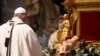 Pope Urges Help for Poor at Low-key Christmas Eve Mass Curbed by Pandemic