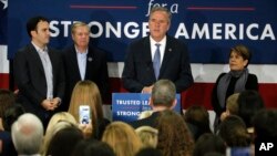 Republican presidential candidate Jeb Bush, accompanied by his wife, Columba, son Jeb Bush Jr., left, and Sen. Lindsey Graham, R-S.C., speaks in Columbia, S.C., Feb. 20, 2016. 