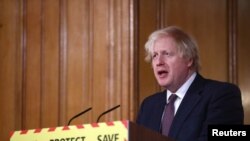 Britain's Prime Minister Boris Johnson holds a virtual news conference at 10 Downing Street, amid the COVID-19 outbreak, in London, March 8, 2021.