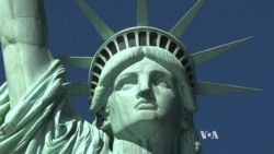 Statue of Liberty Impersonators Welcome Tourists