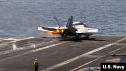 An F/A-18E Super Hornet, attached to Strike Fighter Squadron (VFA) 14, launches from the flight deck of Nimitz-class aircraft carrier USS Abraham Lincoln (CVN 72), May 17, 2026. 