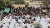 FILE - People fleeing gang violence take shelter at a sports arena, in Port-au-Prince, Haiti, Sept. 1, 2023. 
