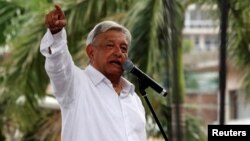 Mexico's President-elect Andres Manuel Lopez Obrador speaks during a rally as part of a tour to thank supporters for his victory in the July 1 election, in Acapulco, Mexico, Oct. 3, 2018. 